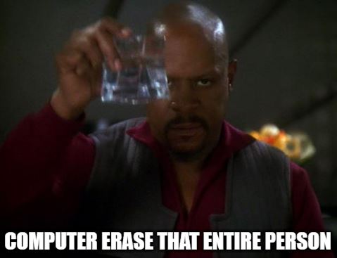 This meme is an image of a character from the TV show "Star Trek: Deep Space Nine" (Quark, the bartender) holding up a glass of water, with a sarcastic expression on his face. The text "Computer, erase that entire file" is written above the image, implying that Quark is frustrated with a computer glitch and wants to delete the entire file, but is instead holding a glass of water, implying he's more concerned about his drink being spilled.
